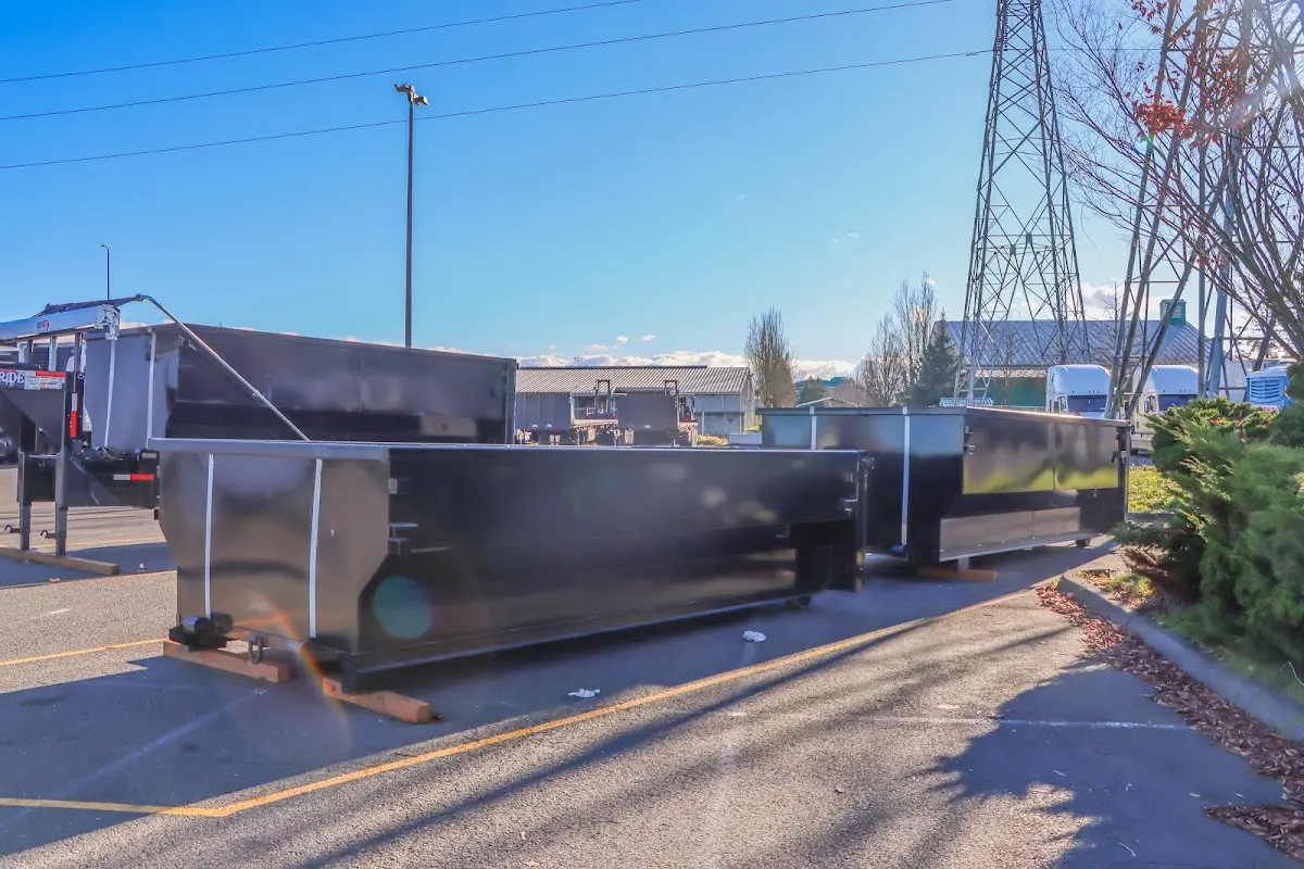 Roll-off dumpster ready for waste disposal at job site for 2 Yard Dumpster Rental in University City
